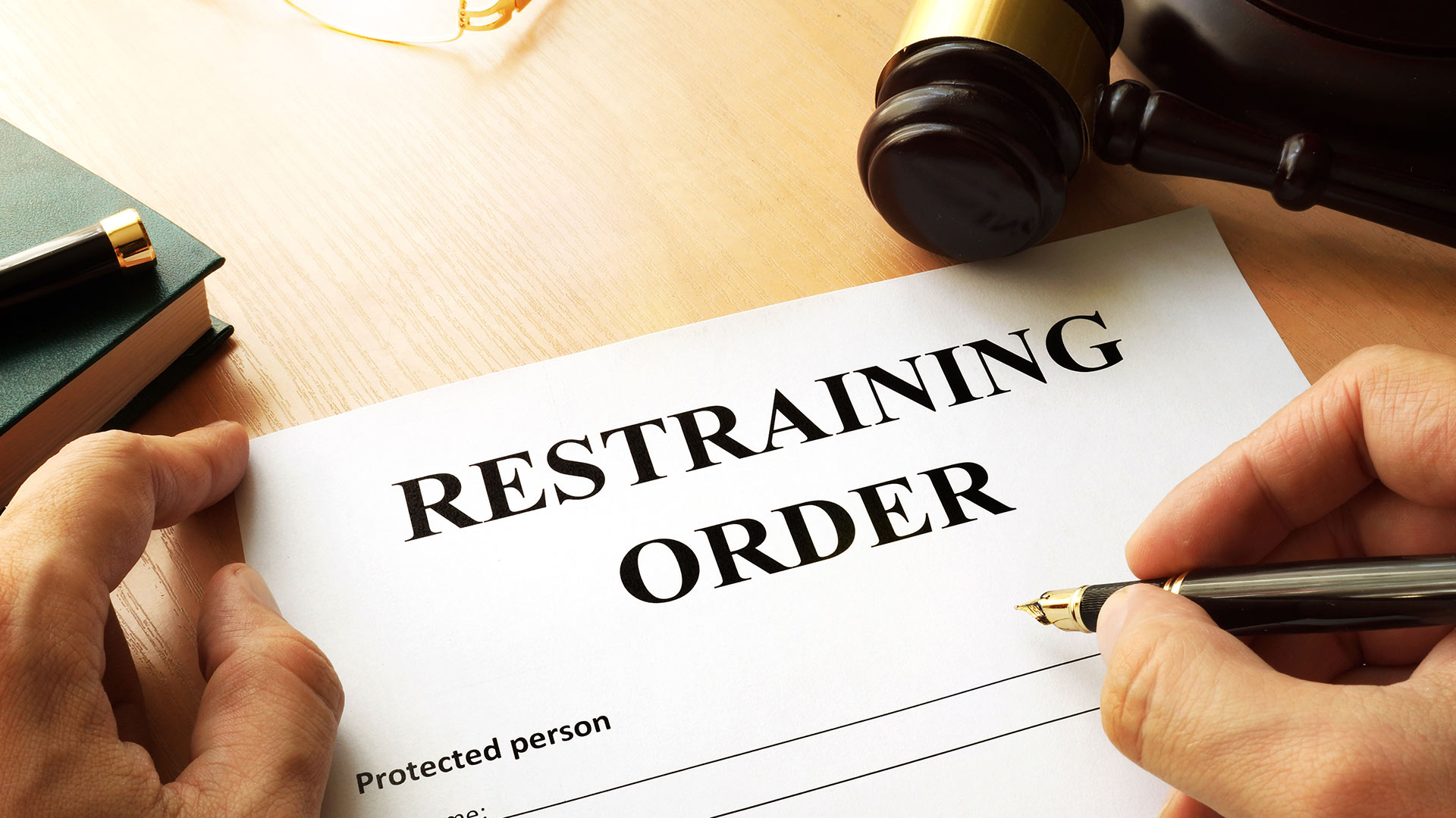 person filling out restraining order scottsdale az